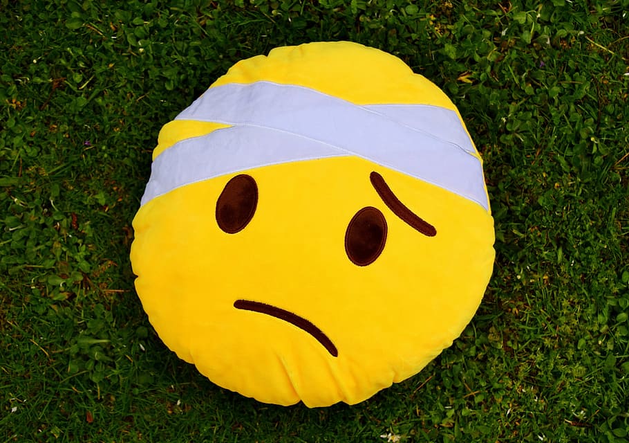 Yellow Sad Emoji Pillow On Grass Fifeld, Get Well Soon, - HD Wallpaper 