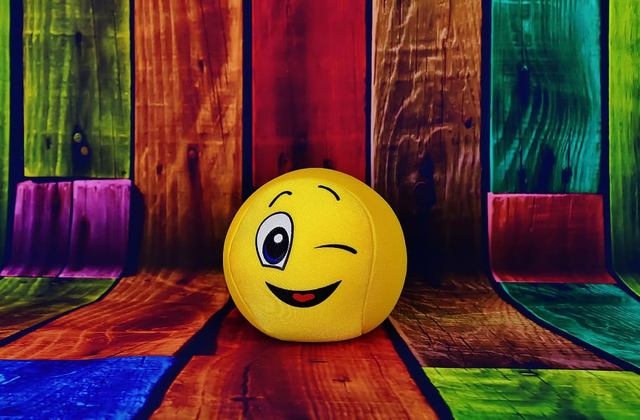 Yellow Emoji On Multicolored Wood Parquet Graphic Wallpaper, - HD Wallpaper 