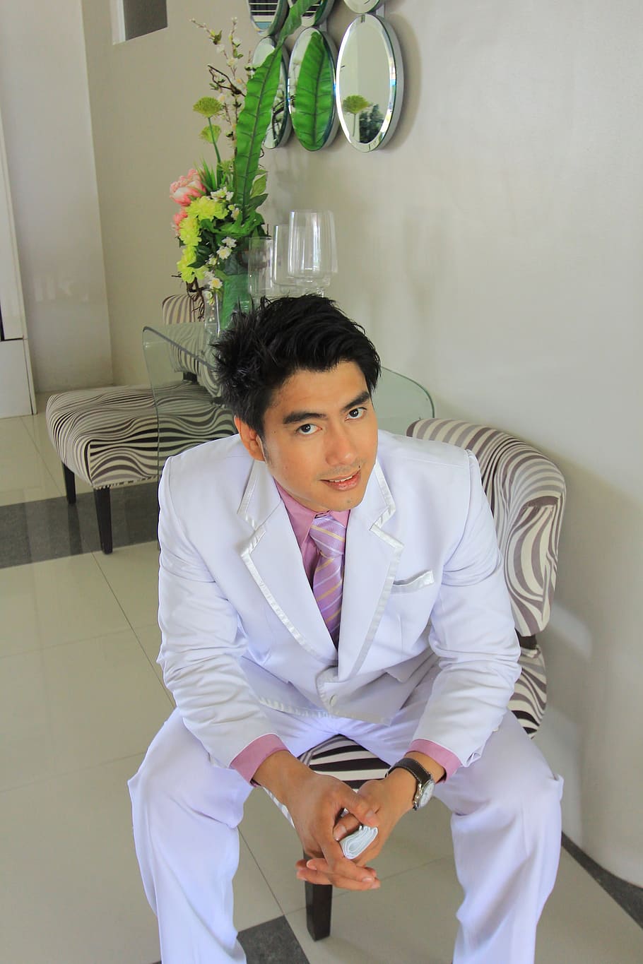 Man In White Suit Sitting On Gray Chair Posing For - HD Wallpaper 