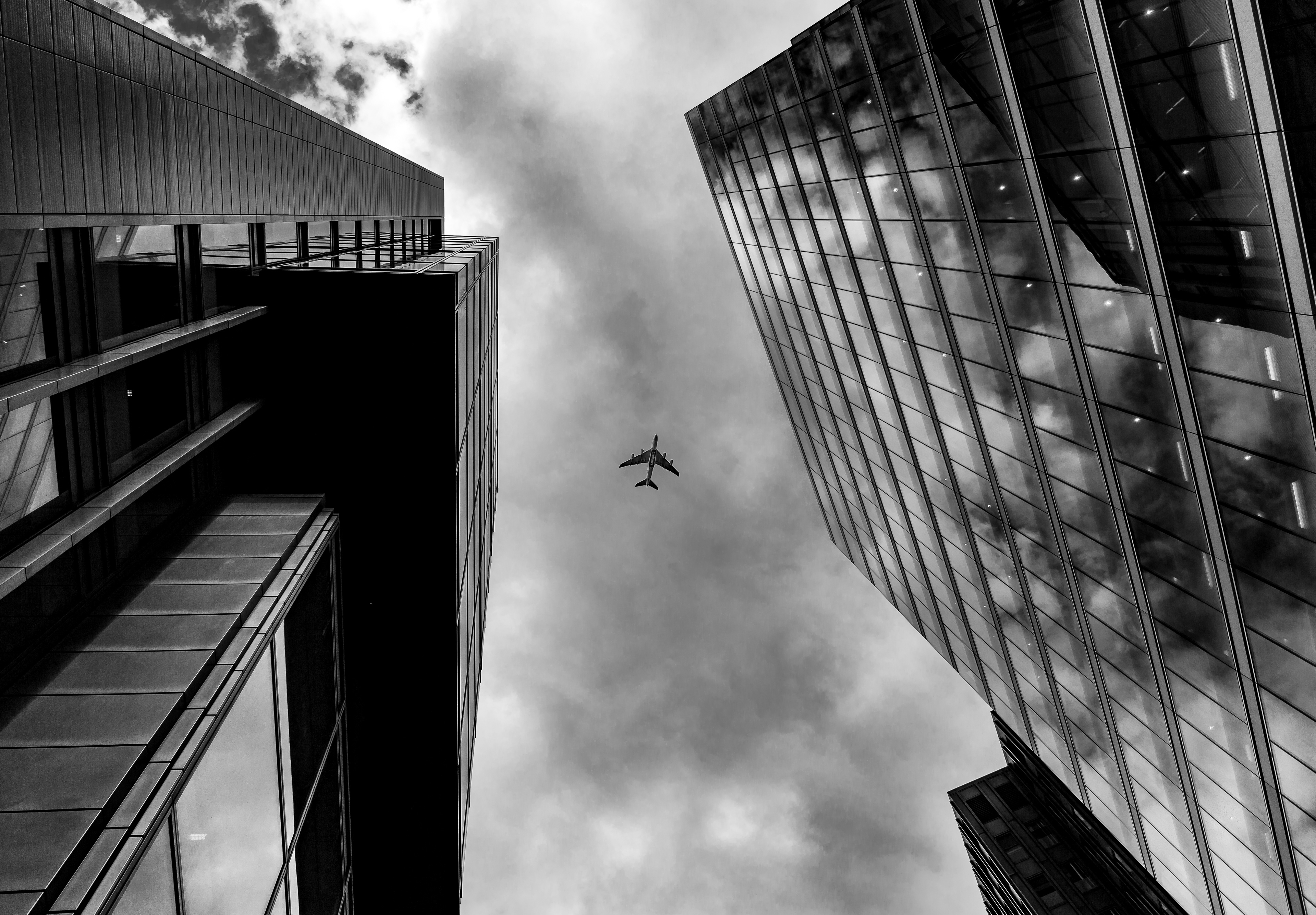 Plane Between Buildings - HD Wallpaper 