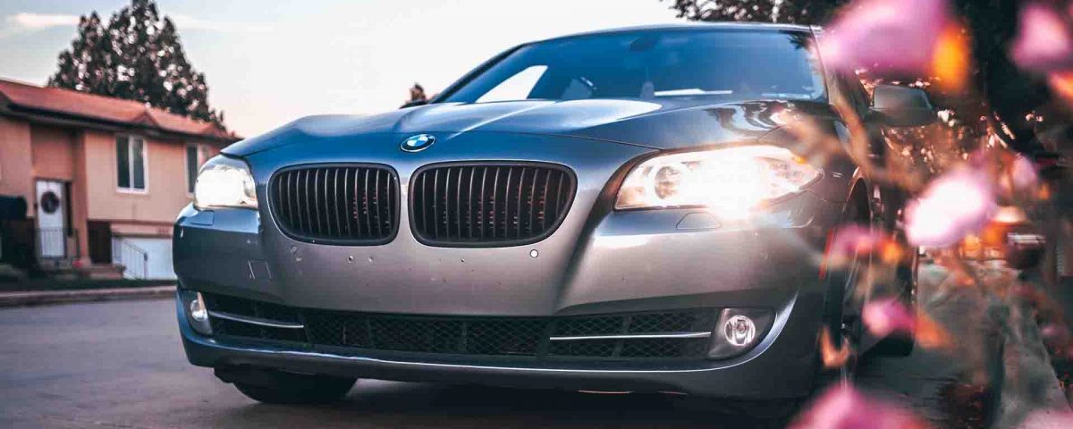 Black Bwm 535 Car On Road With Its Headlights On - Bmw - HD Wallpaper 