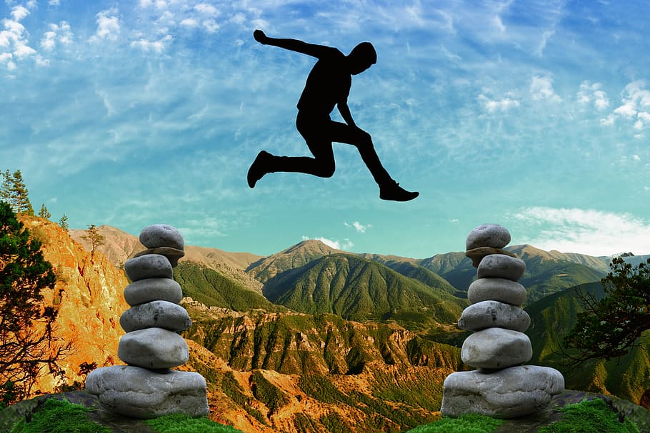 Man Jumps In Between Two Cairns, Risk, Courage, Balance, - Balance Nature - HD Wallpaper 
