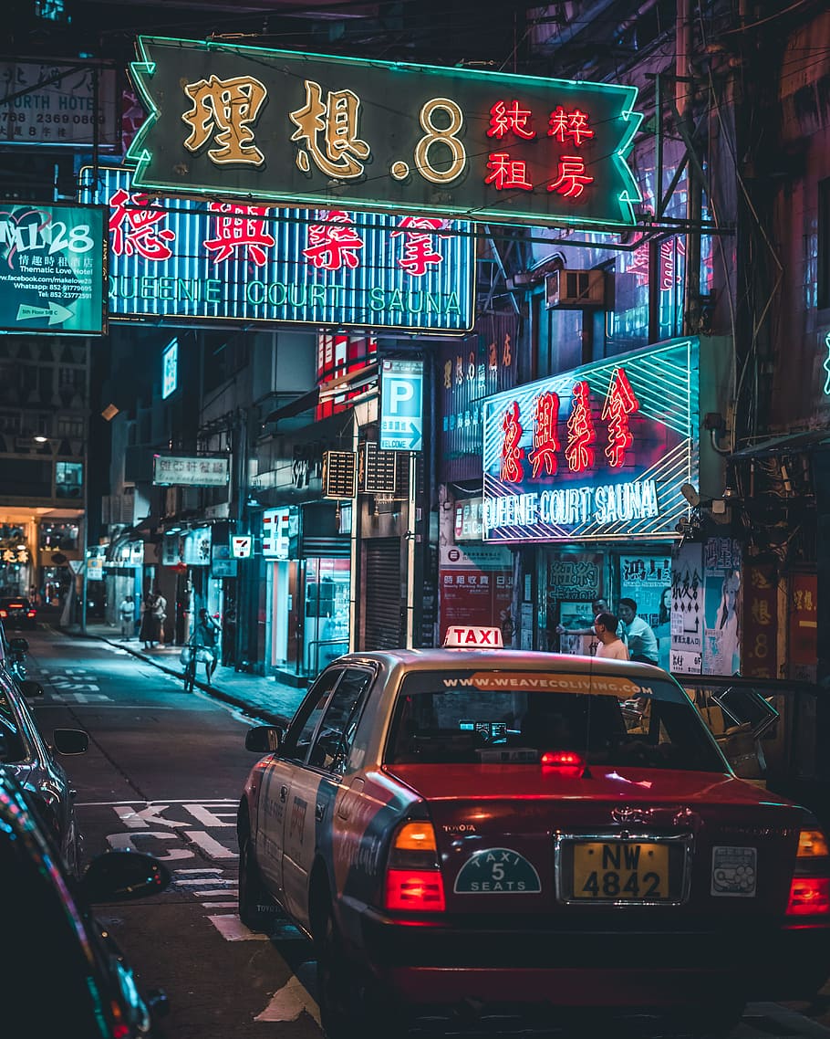 Red And White Taxi Parked Outside The Court Sauna Facade, - Night Photography Hong Kong - HD Wallpaper 