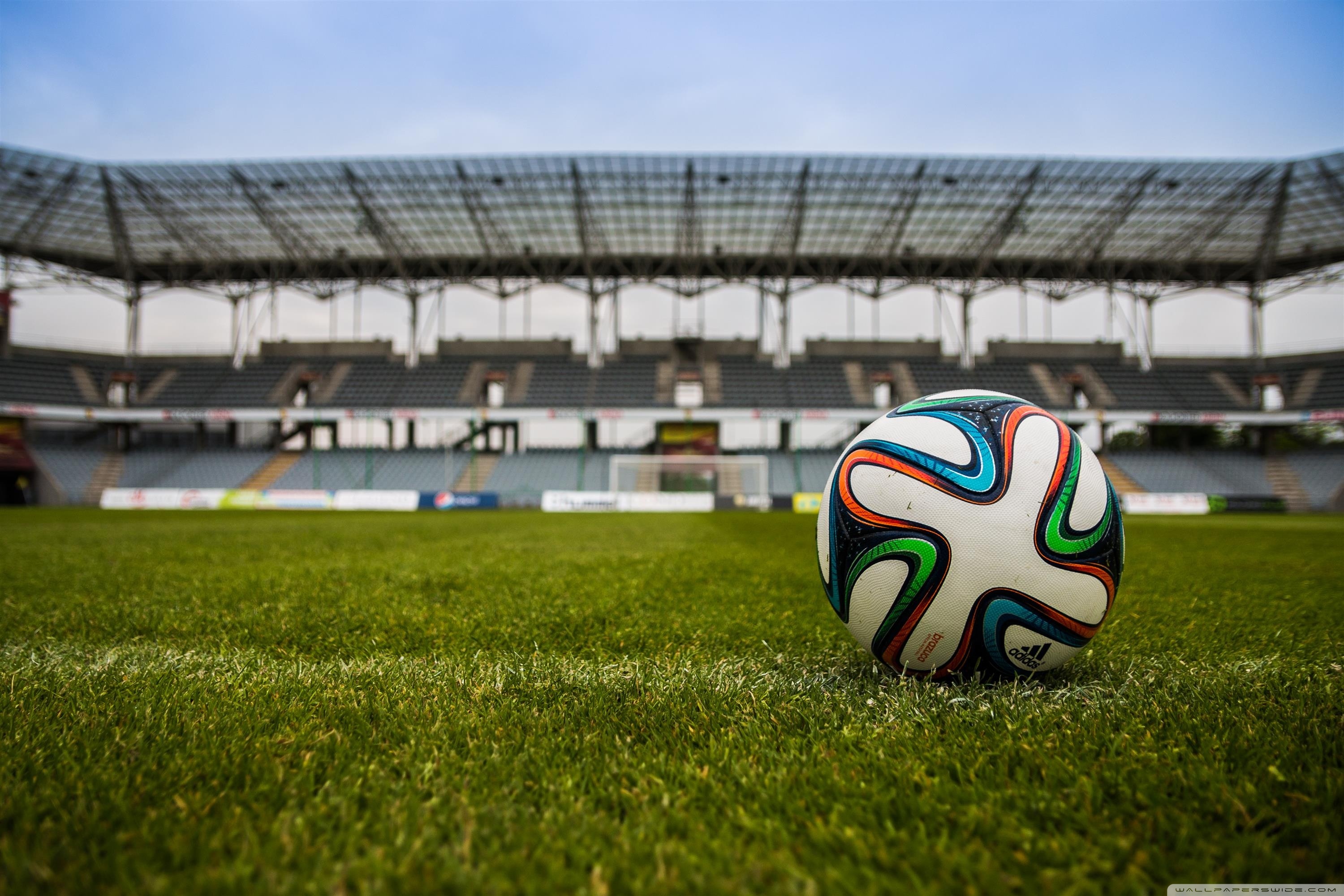 Soccer Balls On A Football Pitch - HD Wallpaper 