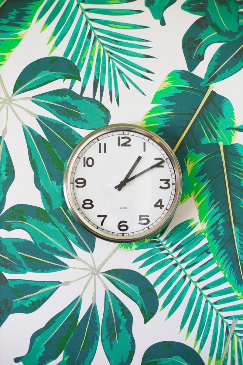 Tropical Leaves Wallpaper Accent Wall In A Kitchen - Clock On Wallpapered Wall - HD Wallpaper 