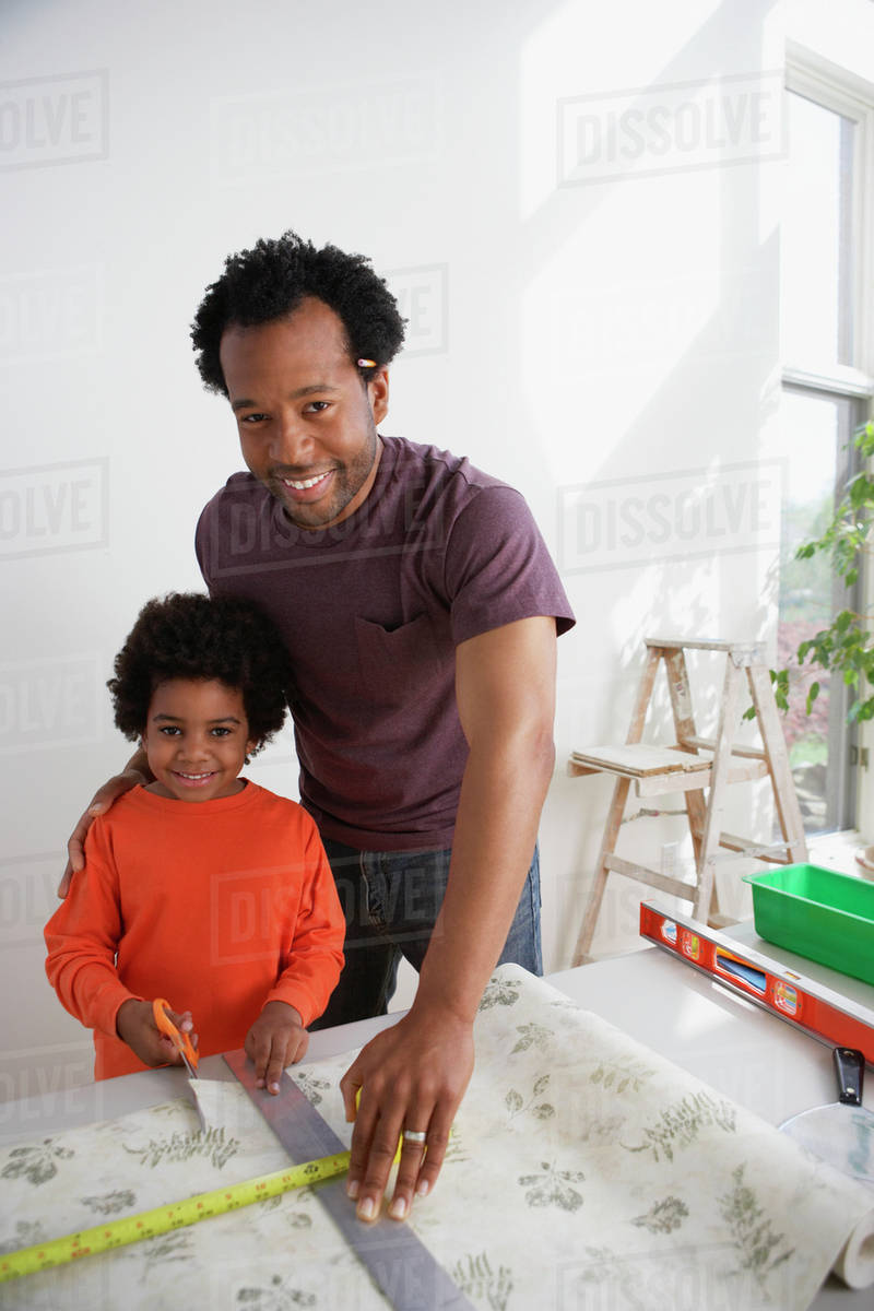 African Father Showing Son How To Measure Wallpaper - Toddler - HD Wallpaper 