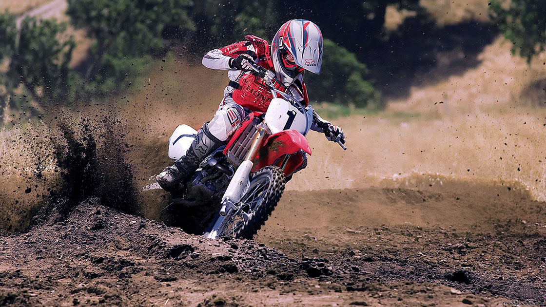 A Dirt Bike Riding On A Dirt Track - High Quality Dirt Bike - HD Wallpaper 