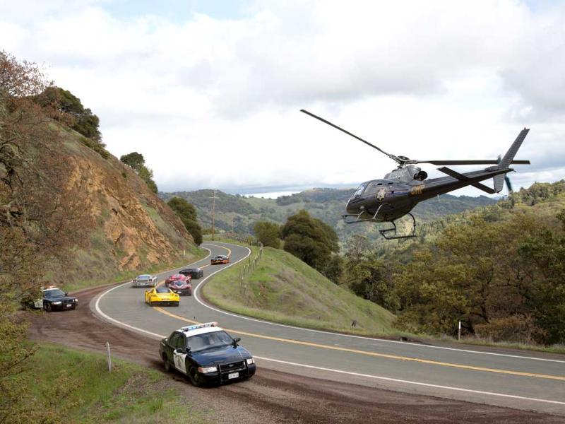 The Story Deals With A Cross Country Race Against Time - Need For Speed Police Helicopter - HD Wallpaper 