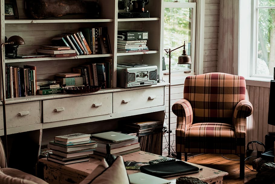 Books On Table, Brown And Black Plaid Armchair Near - Study Room With Books - HD Wallpaper 