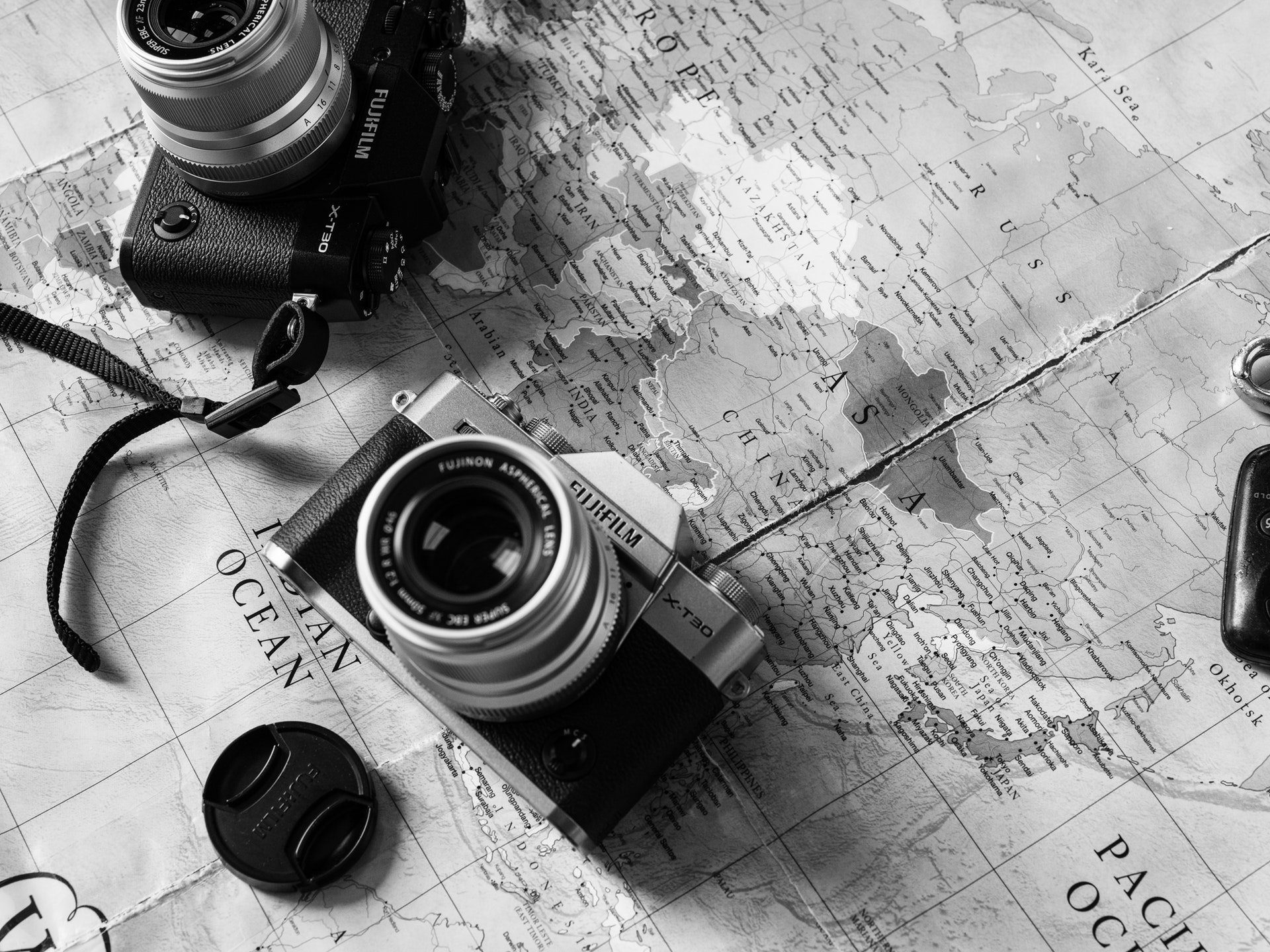 Black And Silver Dslr Camera On Map Imguploads - Camera - HD Wallpaper 