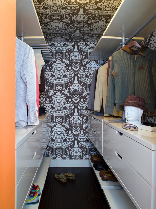 Busy Wallpapered Closet With White Drawers And Shelves - Small Narrow Walk In Closet Design - HD Wallpaper 