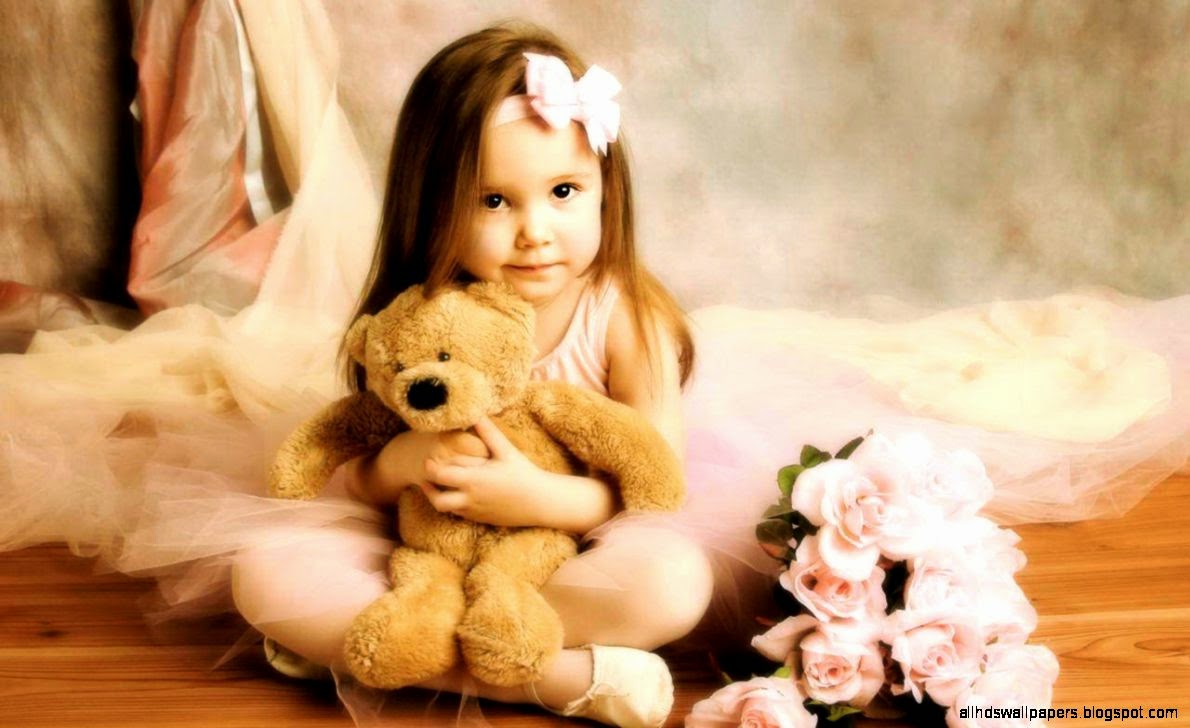 cute baby girl with teddy bear
