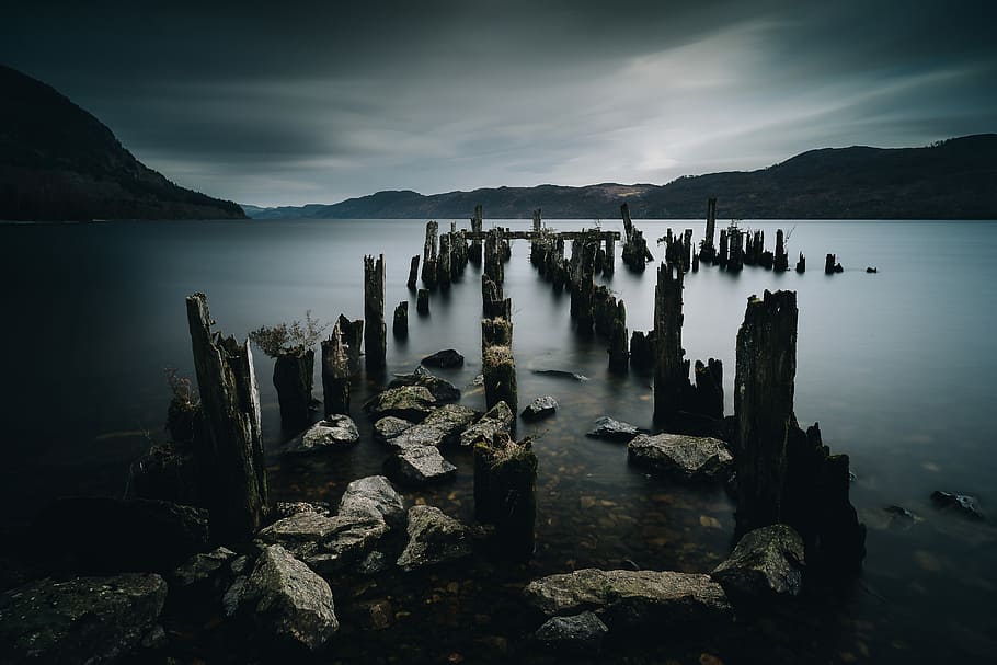 Loch Ness Jetty, Gray Rocks On Body Of Water, Long - Magical Places In Scotland - HD Wallpaper 