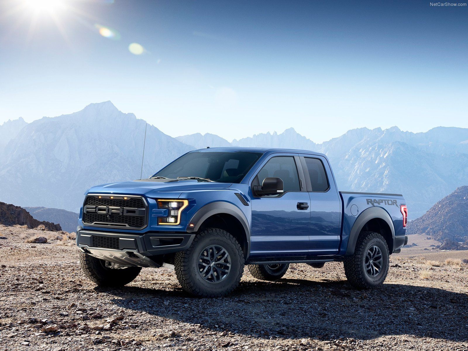 Hot Blue Color Ford Pickup Truck On Mountain 
width - 2017 Ford Raptor Graphics Package - HD Wallpaper 