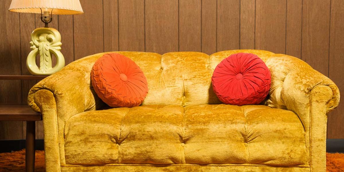 Yellow Velvet Sofa With Red And Orange Pillows In Front - Housewarming Gift In Furniture - HD Wallpaper 