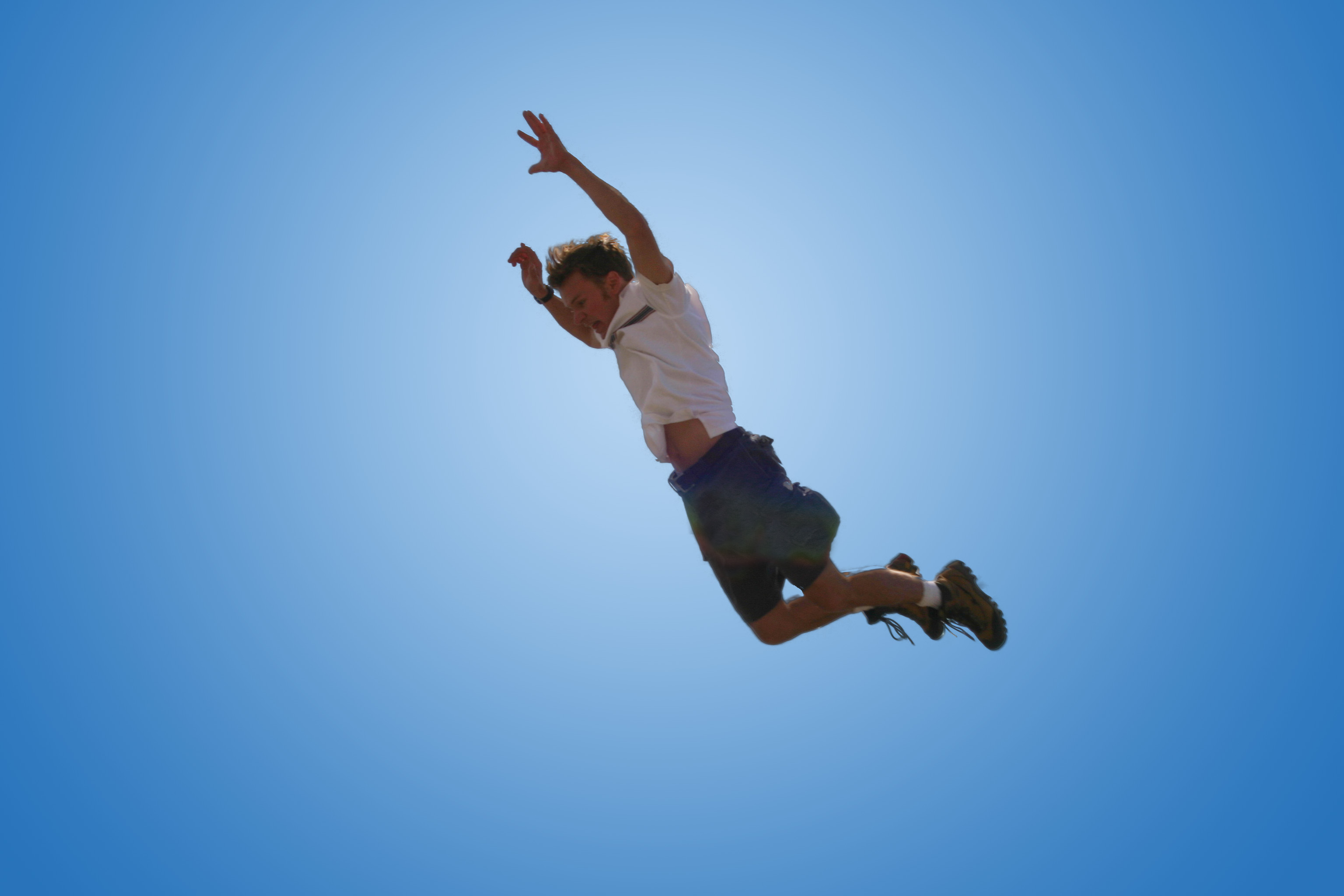 Crazy Jump On A Blue Background - Jumping Man - HD Wallpaper 