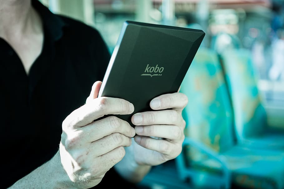 Person Holding Black Kobo Tablet, E Book, E Reader, - E-book - HD Wallpaper 
