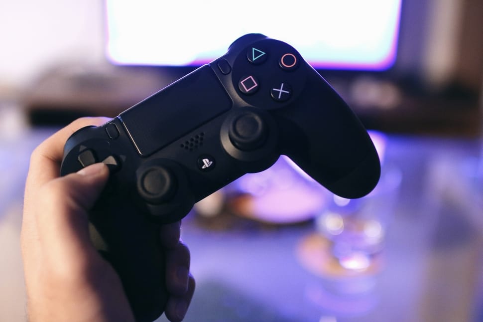Person Holding Sony Ps4 Game Controller Preview - HD Wallpaper 