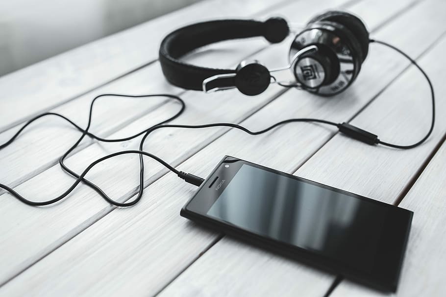 Black Smartphone And Headphones With Various Items, - HD Wallpaper 