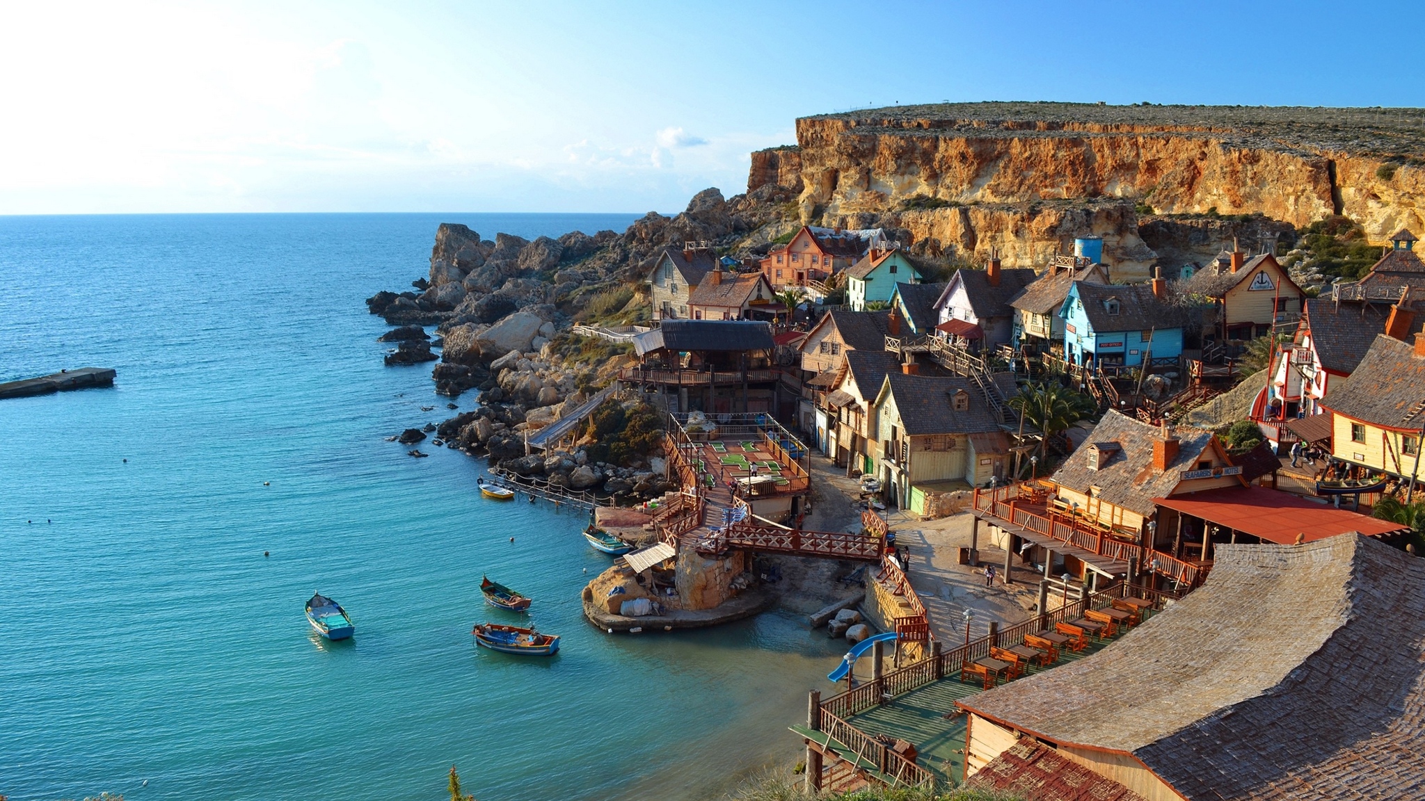 Wallpaper Sea, Mountains, Buildings, Sky, Nature - Popeye Village - HD Wallpaper 