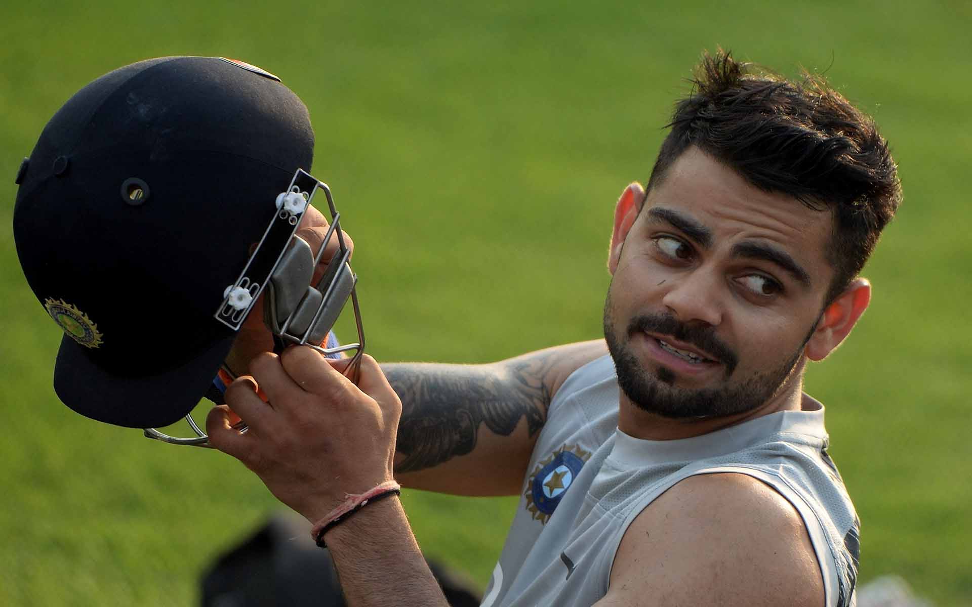 Virat Kohli Wear Helmet In Practice Wallpaper - Virat Kohli Amazing Facts - HD Wallpaper 