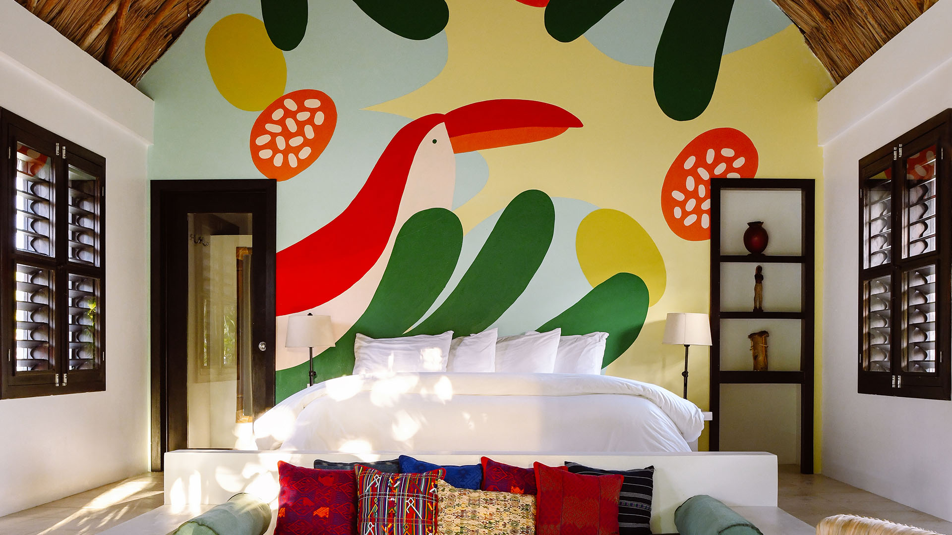 View Of A Room With A Toucan Mural At The Matachica - Matachica Belize - HD Wallpaper 