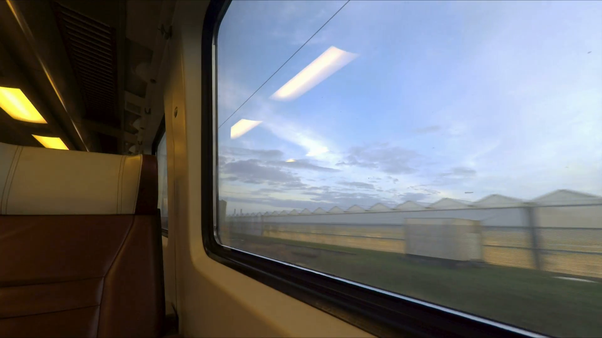 Window View From Fast Train Travelling In The Netherlands View From