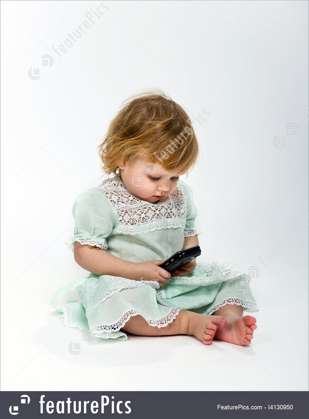 Cute Little Child With Mobile Phone On White Background - Sitting - HD Wallpaper 