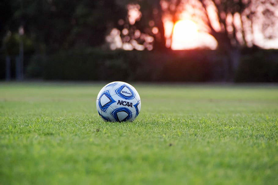 White And Blue Ncaa Soccer Ball On Green Grass Field, - Inspirational Football Captain Quotes - HD Wallpaper 