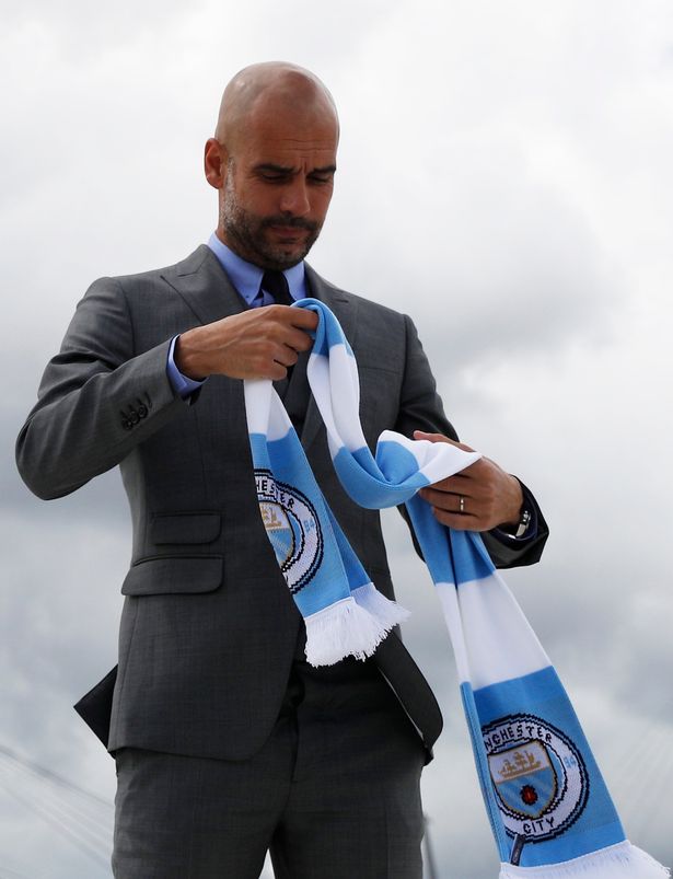 Pep Guardiola Poses Outside The Stadium After His First ...
