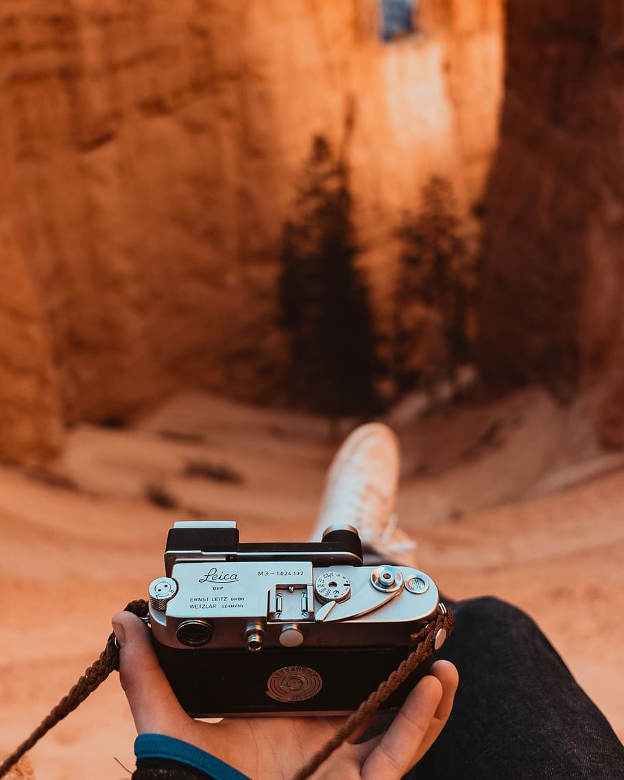 Person Holding Gray Leica Camera, Person Holding Gray - Camera