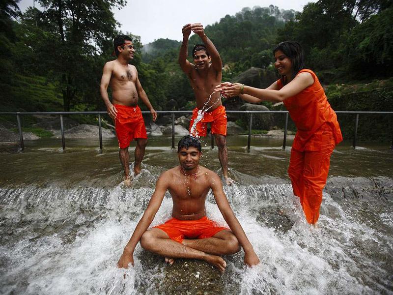 A Hindu Devotee Is Poured With Water By His Friends - Fun - HD Wallpaper 