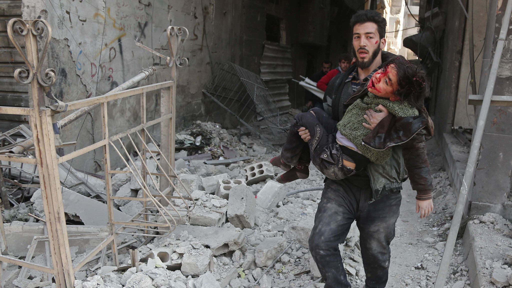 A Syrian Man Rescues A Child After An Air Strike In - Syria War - HD Wallpaper 