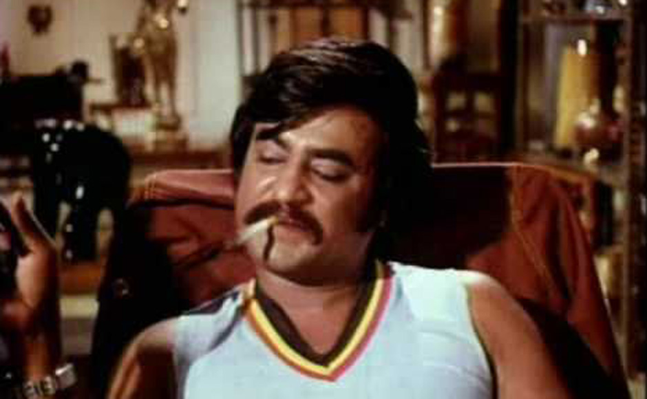 Rajinikanth, Whose Inimitable Style Of Popping A Cigarette - Rajini Cigarette Style - HD Wallpaper 