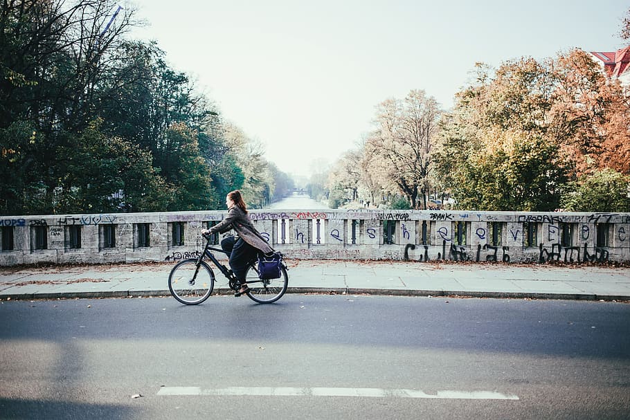 A Young Caucasian Female Cyclist On A River Bridge - Stock.xchng - HD Wallpaper 