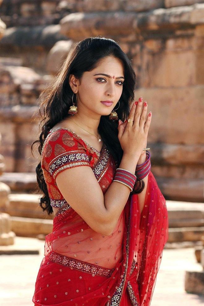 South Indian Actress Photos In Saree Photos - Anushka Shetty In Red Saree - 660x990 Wallpaper South Indian Actress Photos In Saree Photos - Anushka Shetty In Red Saree - 660x990 Wallpaper