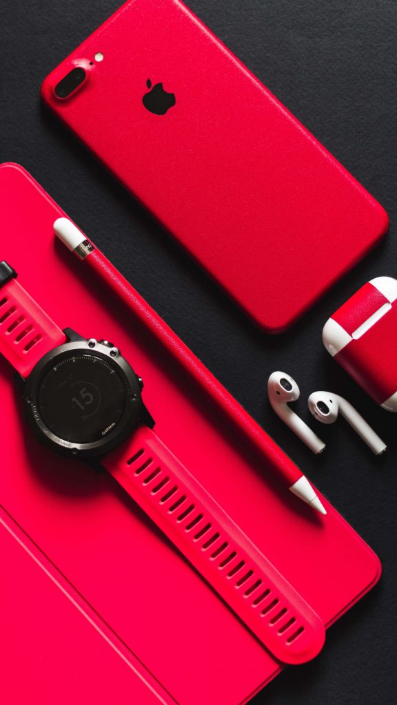 Red Iphone Accessories, Airpods, Iphone And A Smartwatch - Mobile Iphone Wallpaper  Hd - 576x1024 Wallpaper 