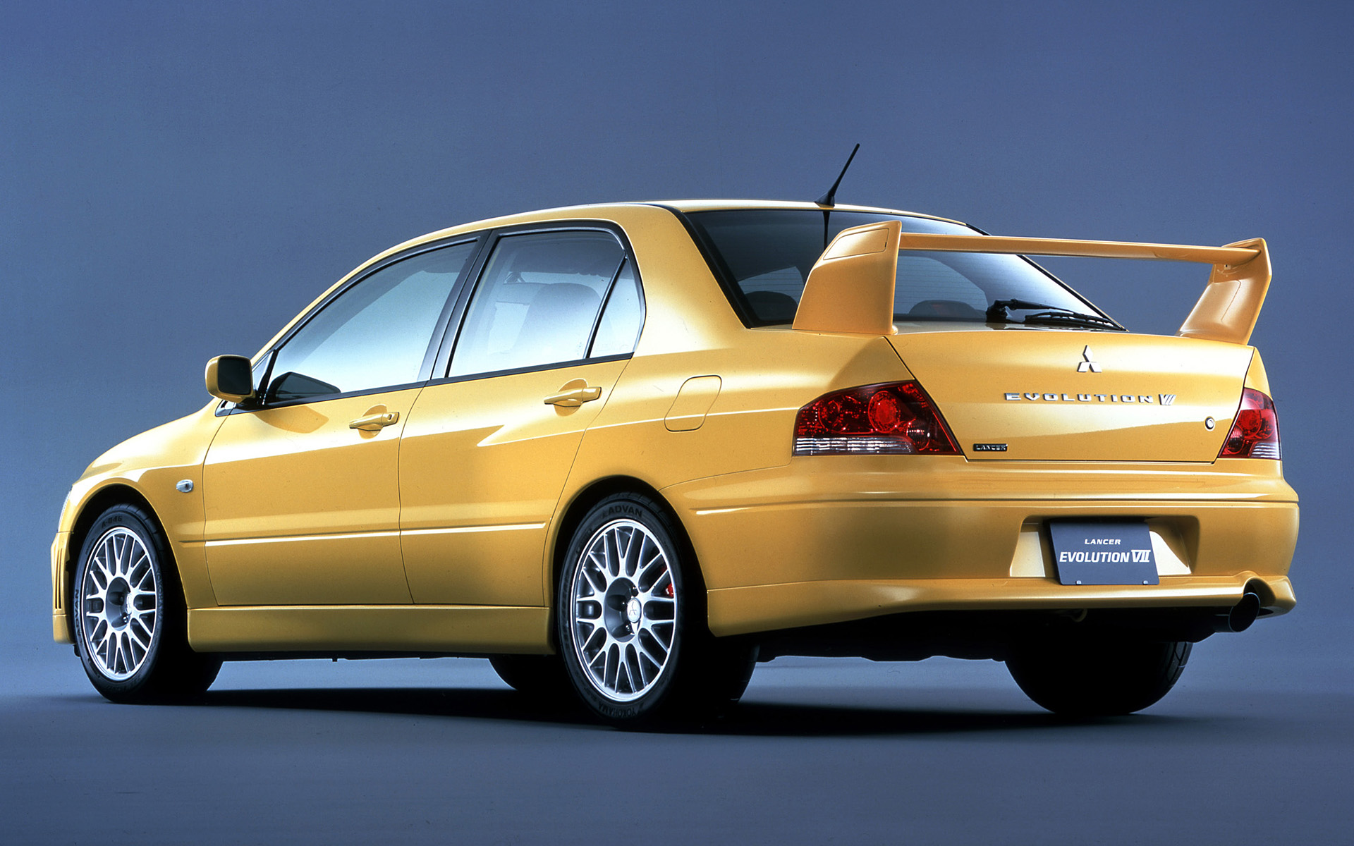 Yellow Mitsubishi Lancer Evolution 7 - HD Wallpaper 