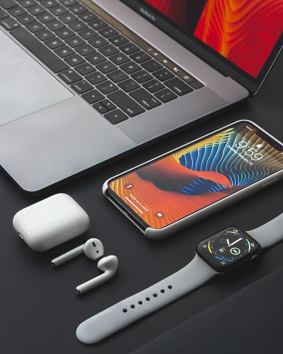Space Gray Iphone X Turned On Beside Apple Airpods - Apple Iphone Airpods Macbook - HD Wallpaper 